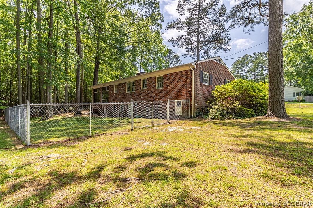 89 Walnut Road Kilmarnock, VA 22482 - Photo 3 of 38 Rear View with Fenced Yard
