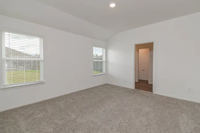 an empty room with windows