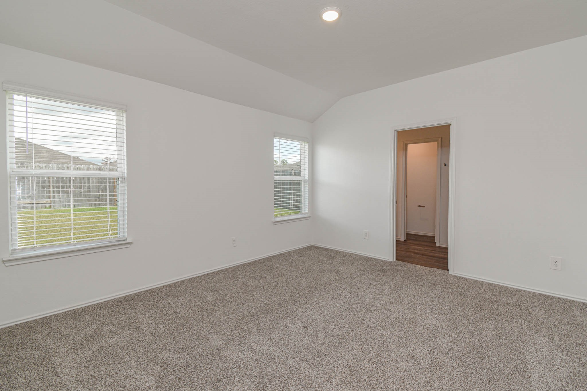 5423 Wyndham Ridge Ln Spring Spring, TX 77373 - Photo 14 of 23 an empty room with windows