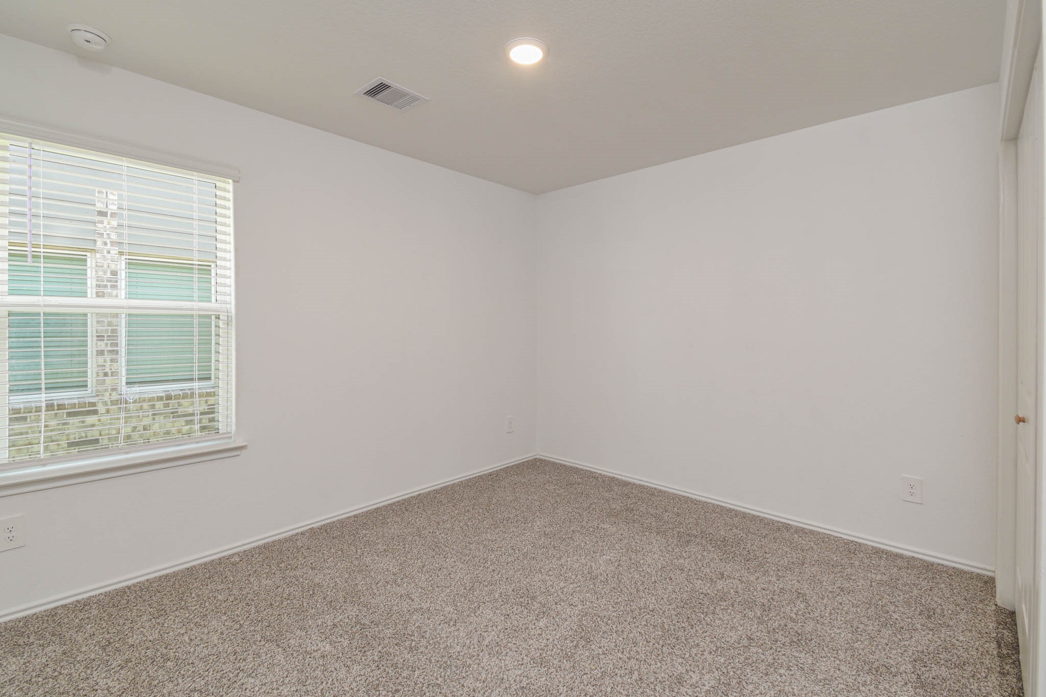 5423 Wyndham Ridge Ln Spring Spring, TX 77373 - Photo 19 of 23 an empty room with a window