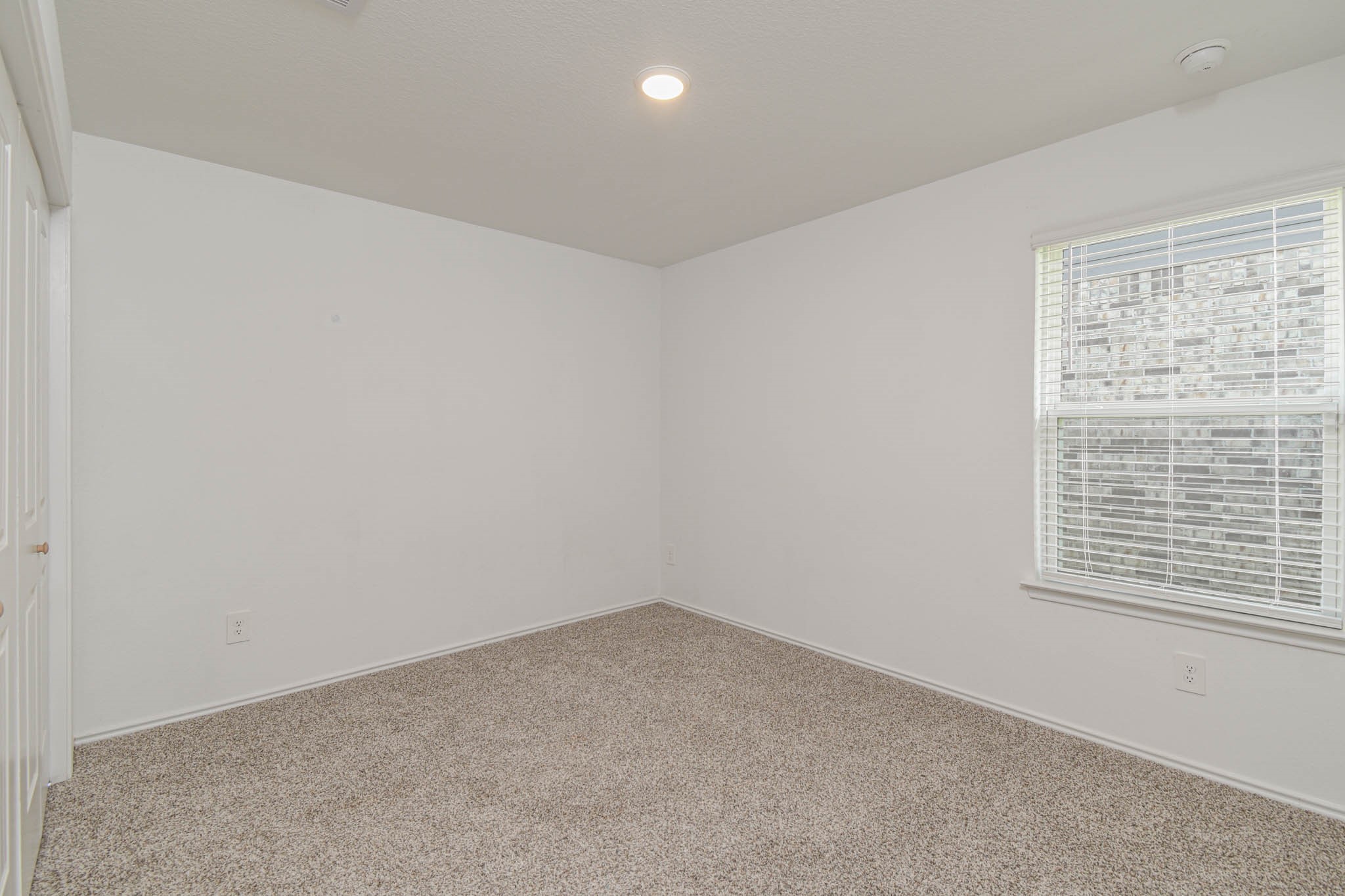 5423 Wyndham Ridge Ln Spring Spring, TX 77373 - Photo 22 of 23 an empty room with a window
