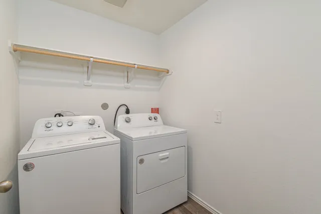 a utility room with dryer and washer