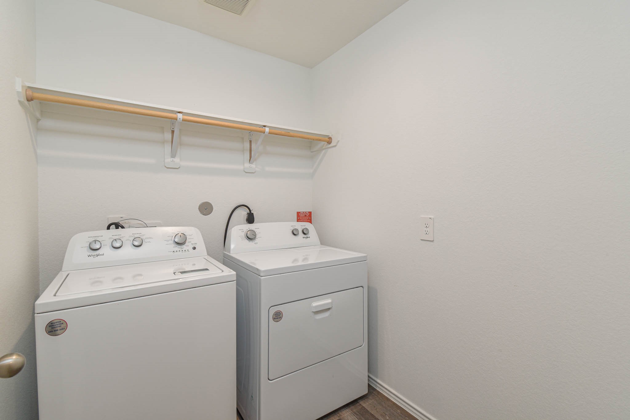 5423 Wyndham Ridge Ln Spring Spring, TX 77373 - Photo 9 of 23 a utility room with dryer and washer