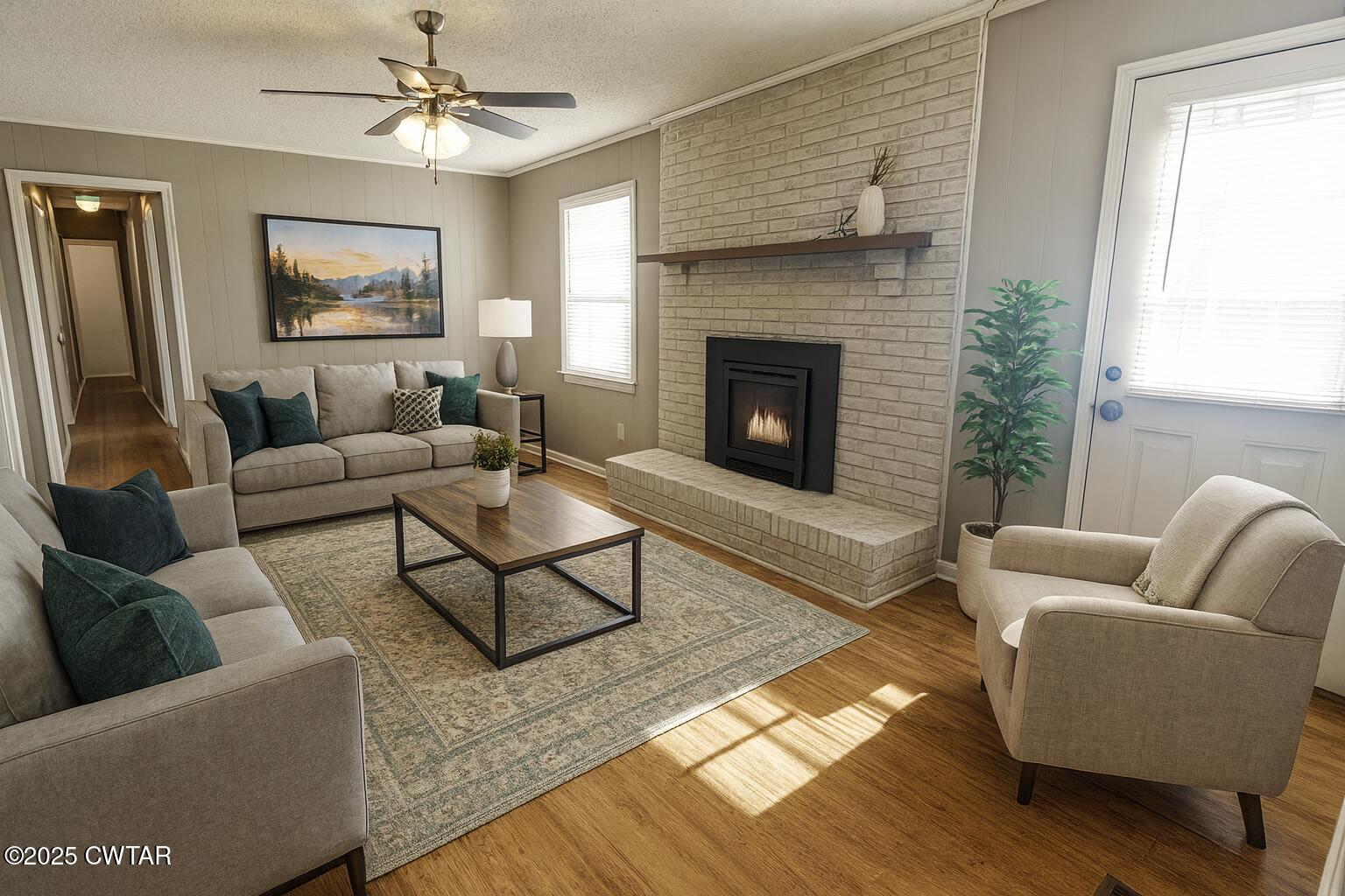 1705 Highway 100 Decaturville, TN 38329 - Photo 18 of 45 a living room with furniture and a fireplace