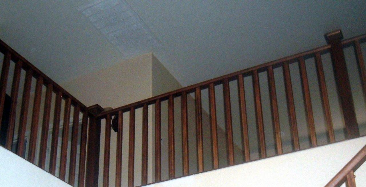 9861 Barley Road Florence, AZ 85132 - Photo 6 of 20 Cherry stained wood railing