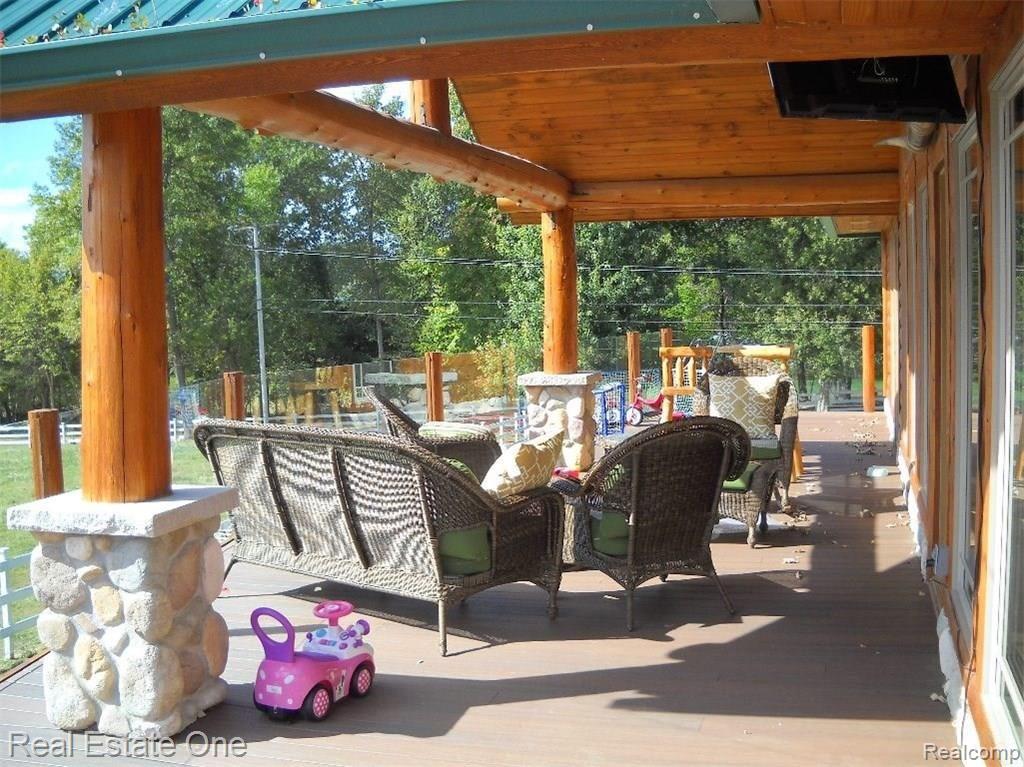 11611 Newman Road Brighton, MI 48114 - Photo 20 of 23 Spacious Trex Deck.JPG