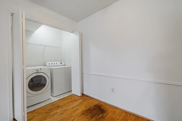 a view of a storage & utility room with washer and dryer