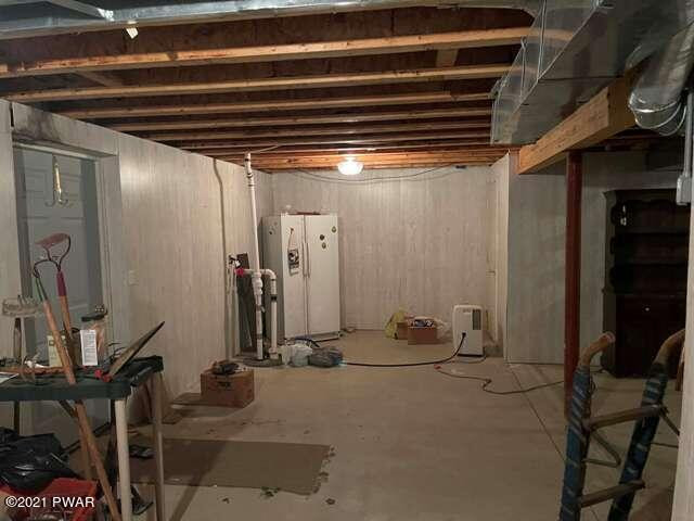 144 Skyview Road Dingmans Ferry, PA 18328 - Photo 15 of 16 a view of a room with gym equipment
