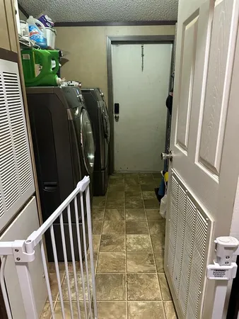 a view of storage and utility room