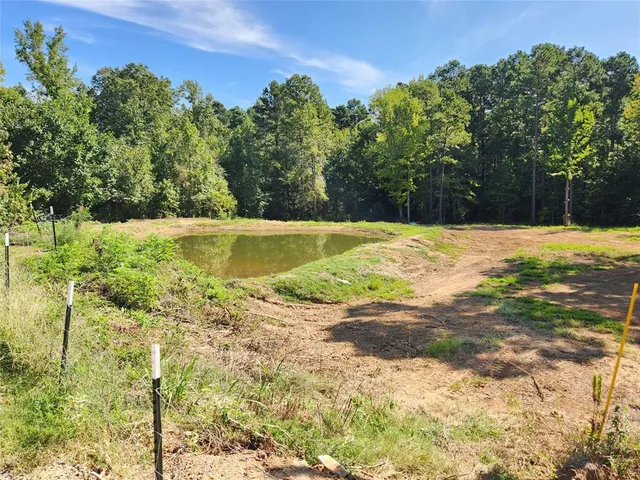 a view of a swimming pool with an outdoor space