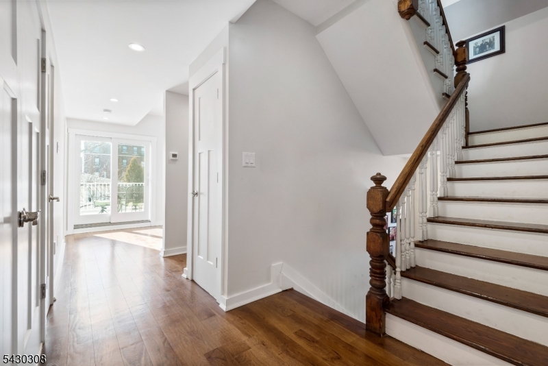 19 78th Street North Bergen, NJ 07047 - Photo 20 of 42 a view of entryway with wooden floor and stairs