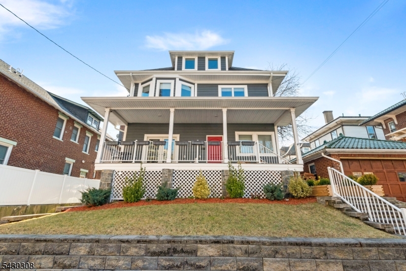 19 78th Street North Bergen, NJ 07047 - Photo 2 of 42 front view of a house with a porch
