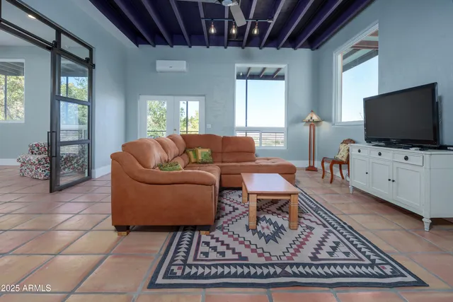 a bathroom with a shower a toilet and a sink