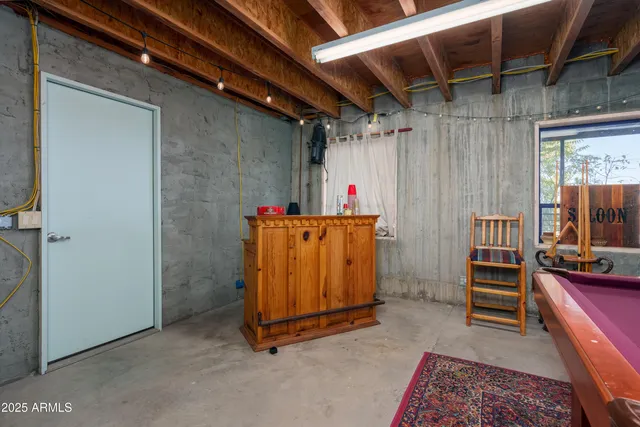 an aerial view of a house with a garden