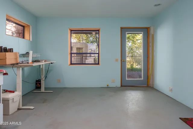 a view of a house with a mountain in the background