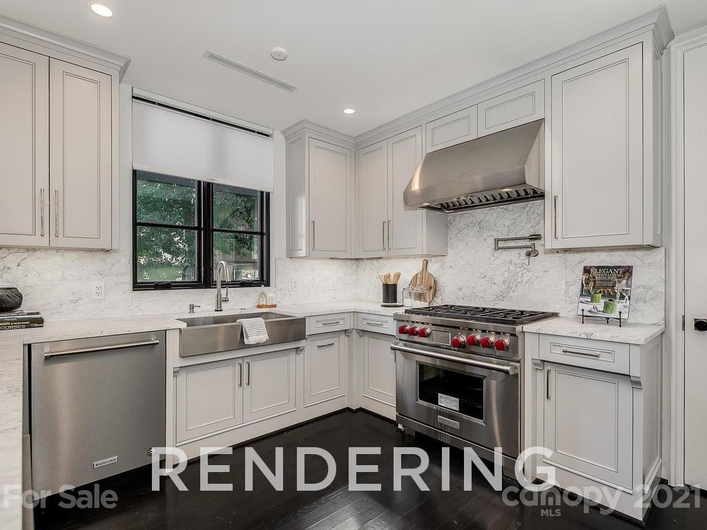 1333 Queens Road, Unit D2 Charlotte, NC 28207 - Photo 14 of 30 a kitchen with a sink stove and cabinets