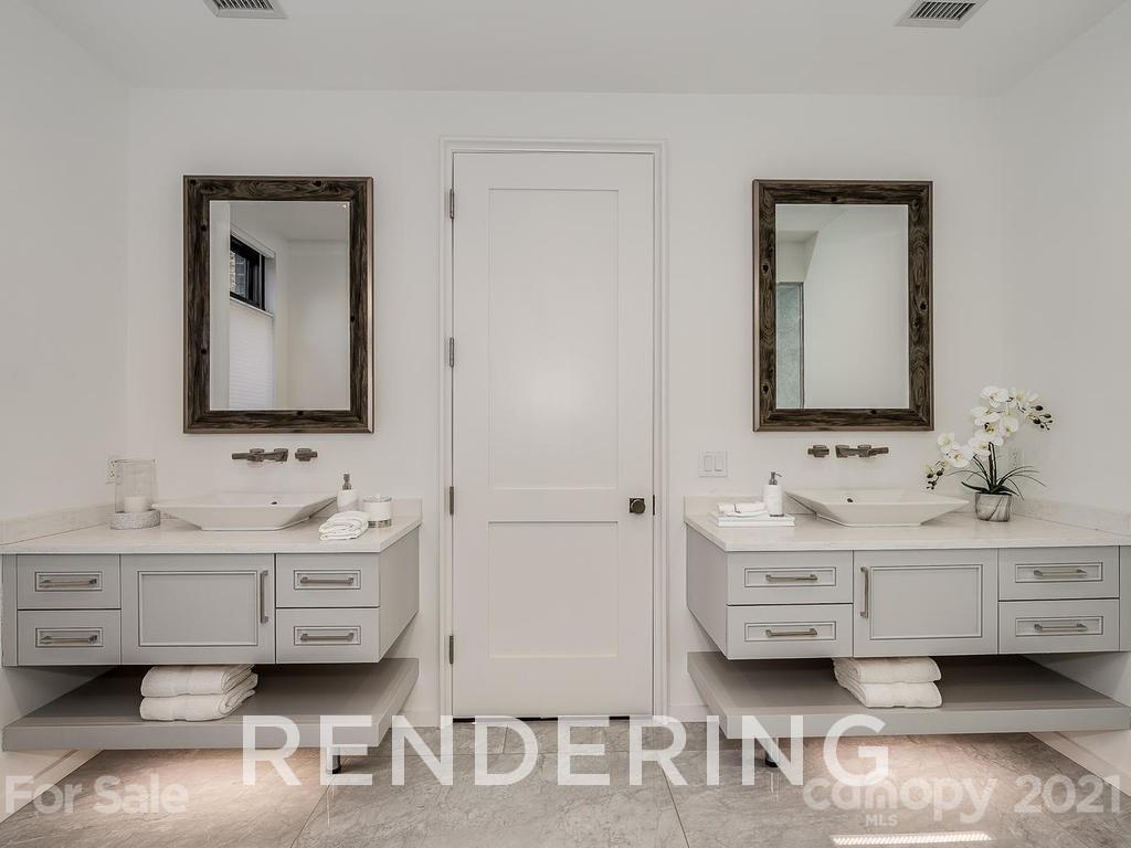 1333 Queens Road, Unit D2 Charlotte, NC 28207 - Photo 22 of 30 a bathroom with a double vanity sink mirror and bathtub