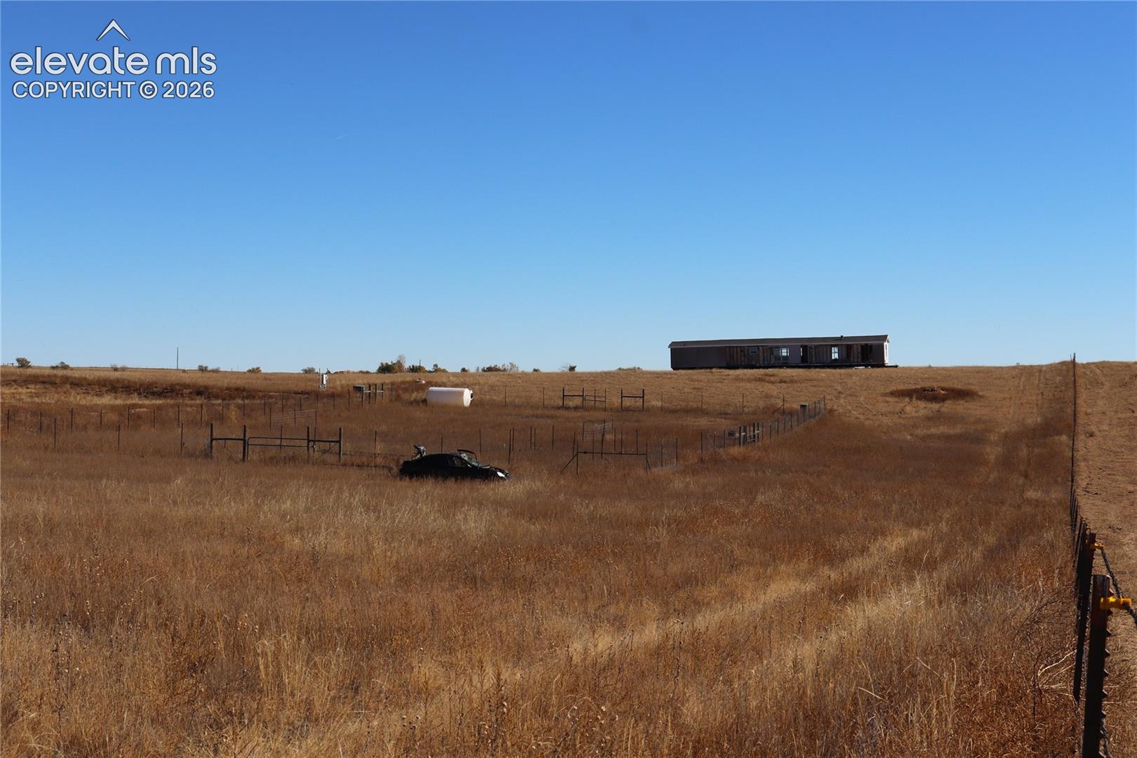 35520 Bowen Road Yoder, CO 80864 - Photo 17 of 21 View of yard featuring a view of rural / pastoral area