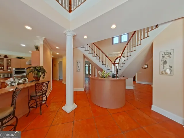 a view of livingroom and dining room with furniture