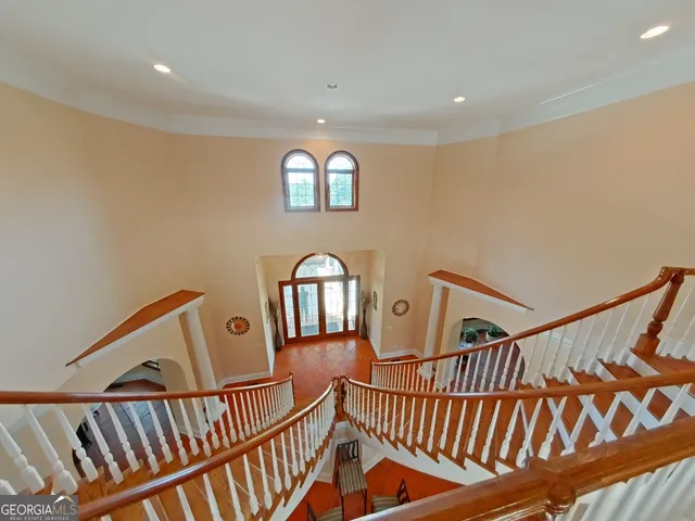 a view of a hallway with windows