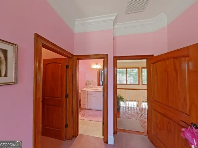 a bathroom with a sink a vanity and a mirror