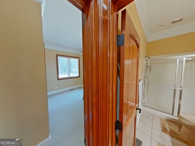 a bathroom with a double vanity sink and mirror