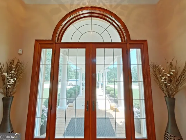 a view of swimming pool with a garden