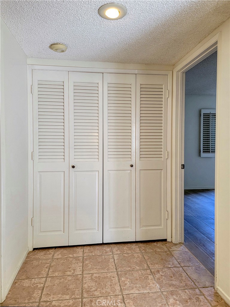 3370 Punta Alta, Unit C Laguna Woods, CA 92637 - Photo 12 of 29 a view of a livingroom with wooden floor