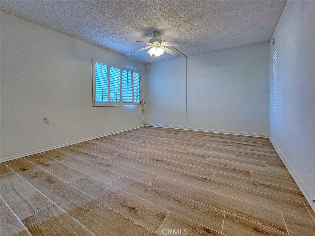 3370 Punta Alta, Unit C Laguna Woods, CA 92637 - Photo 17 of 29 a view of an empty room with a window