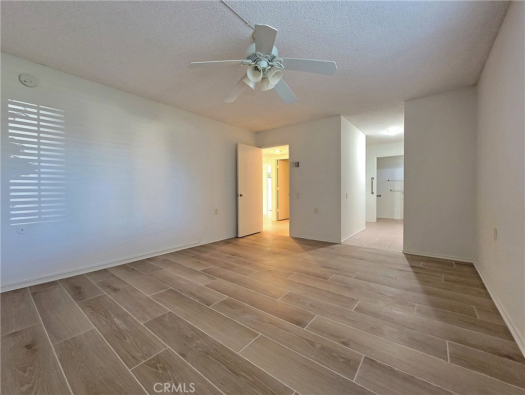 3370 Punta Alta, Unit C Laguna Woods, CA 92637 - Photo 18 of 29 a view of an empty room with a window