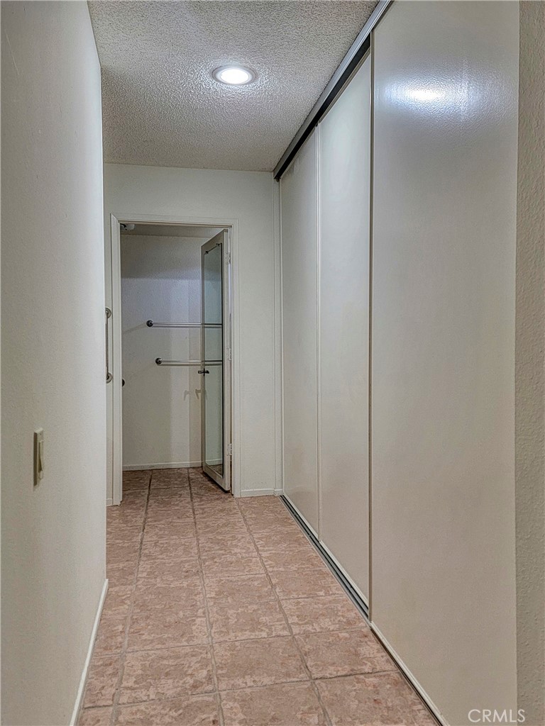 3370 Punta Alta, Unit C Laguna Woods, CA 92637 - Photo 19 of 29 a view of hallway