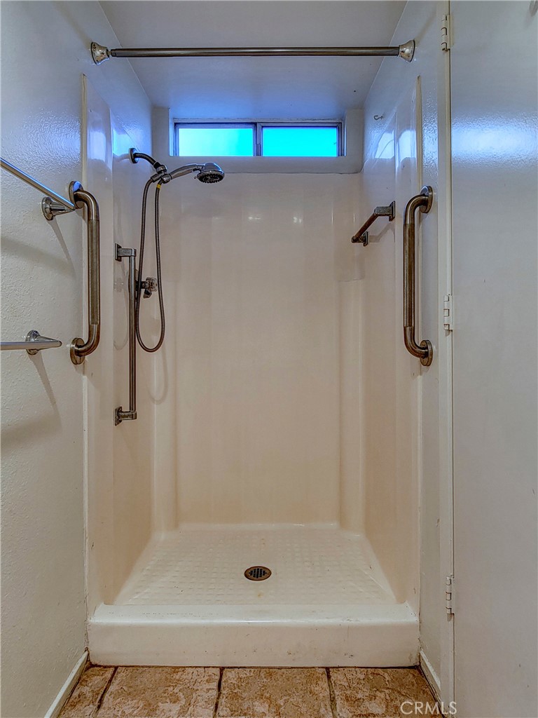 3370 Punta Alta, Unit C Laguna Woods, CA 92637 - Photo 21 of 29 a bathroom with a shower