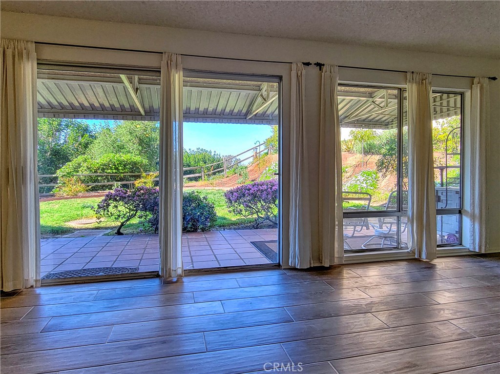 3370 Punta Alta, Unit C Laguna Woods, CA 92637 - Photo 22 of 29 a view of an entryway with wooden floor