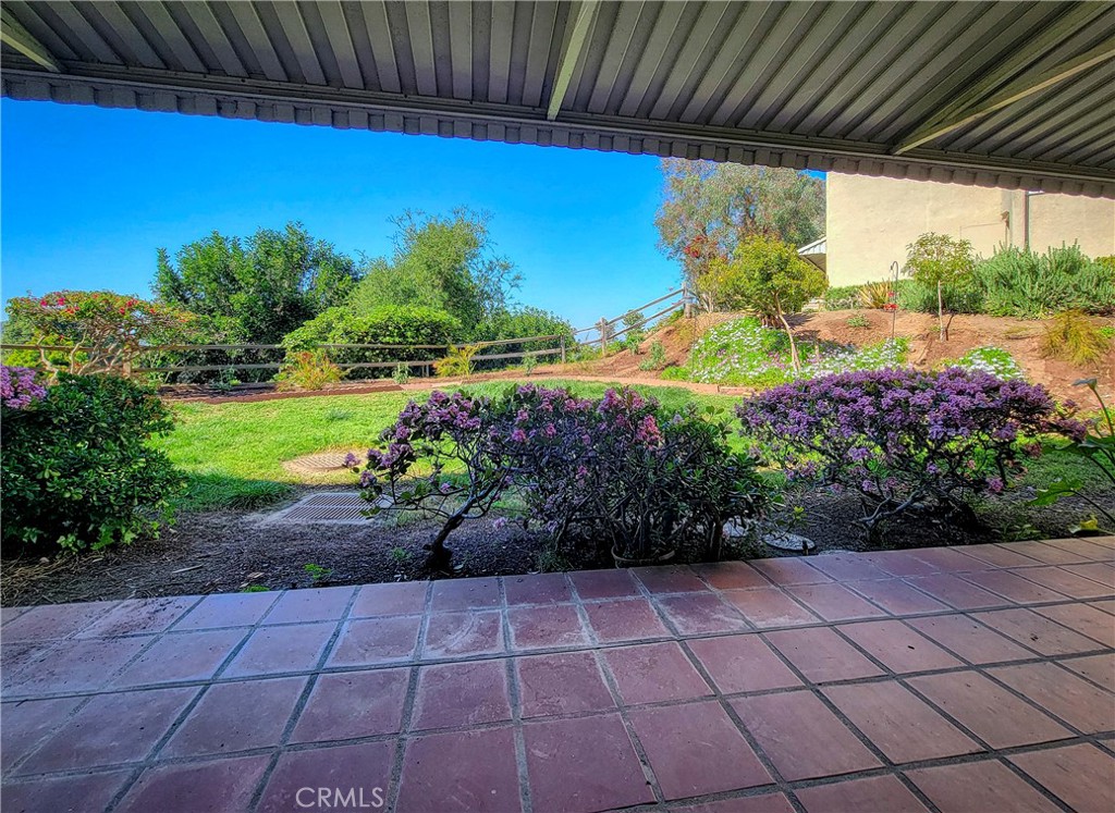 3370 Punta Alta, Unit C Laguna Woods, CA 92637 - Photo 24 of 29 a view of a backyard