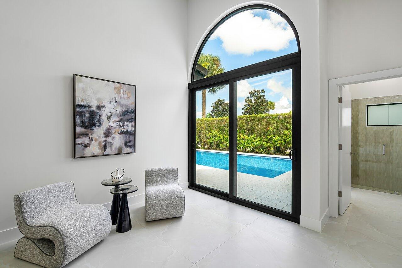 5529 Steeple Chase Boca Raton, FL 33496 - Photo 15 of 56 a view of a livingroom with furniture and a potted plant