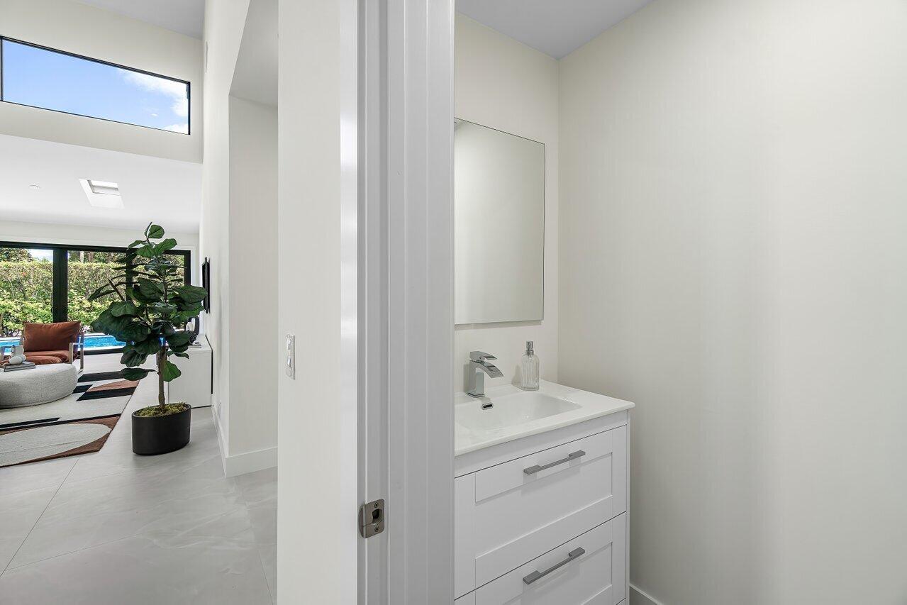 5529 Steeple Chase Boca Raton, FL 33496 - Photo 29 of 56 a view of utility room and bedroom