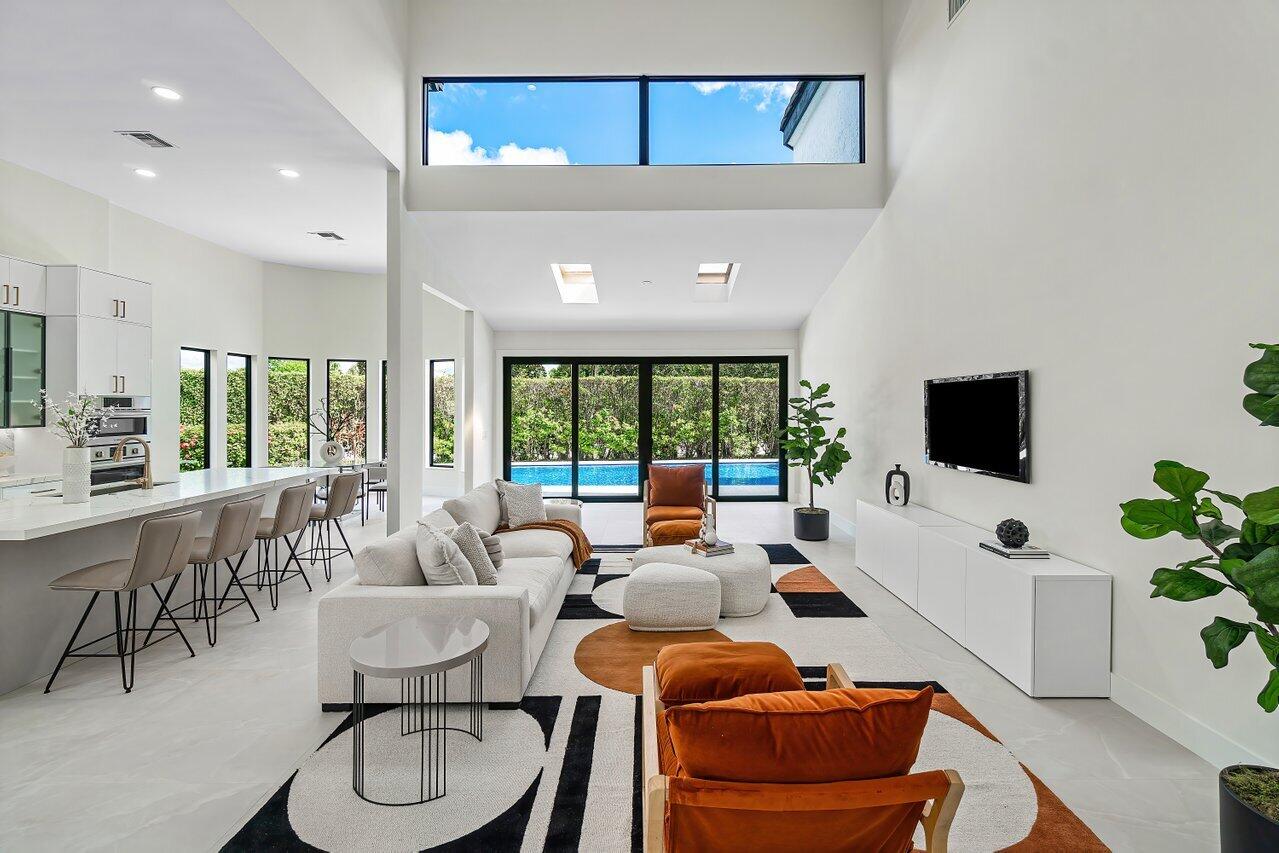 5529 Steeple Chase Boca Raton, FL 33496 - Photo 4 of 56 a living room with furniture and a flat screen tv