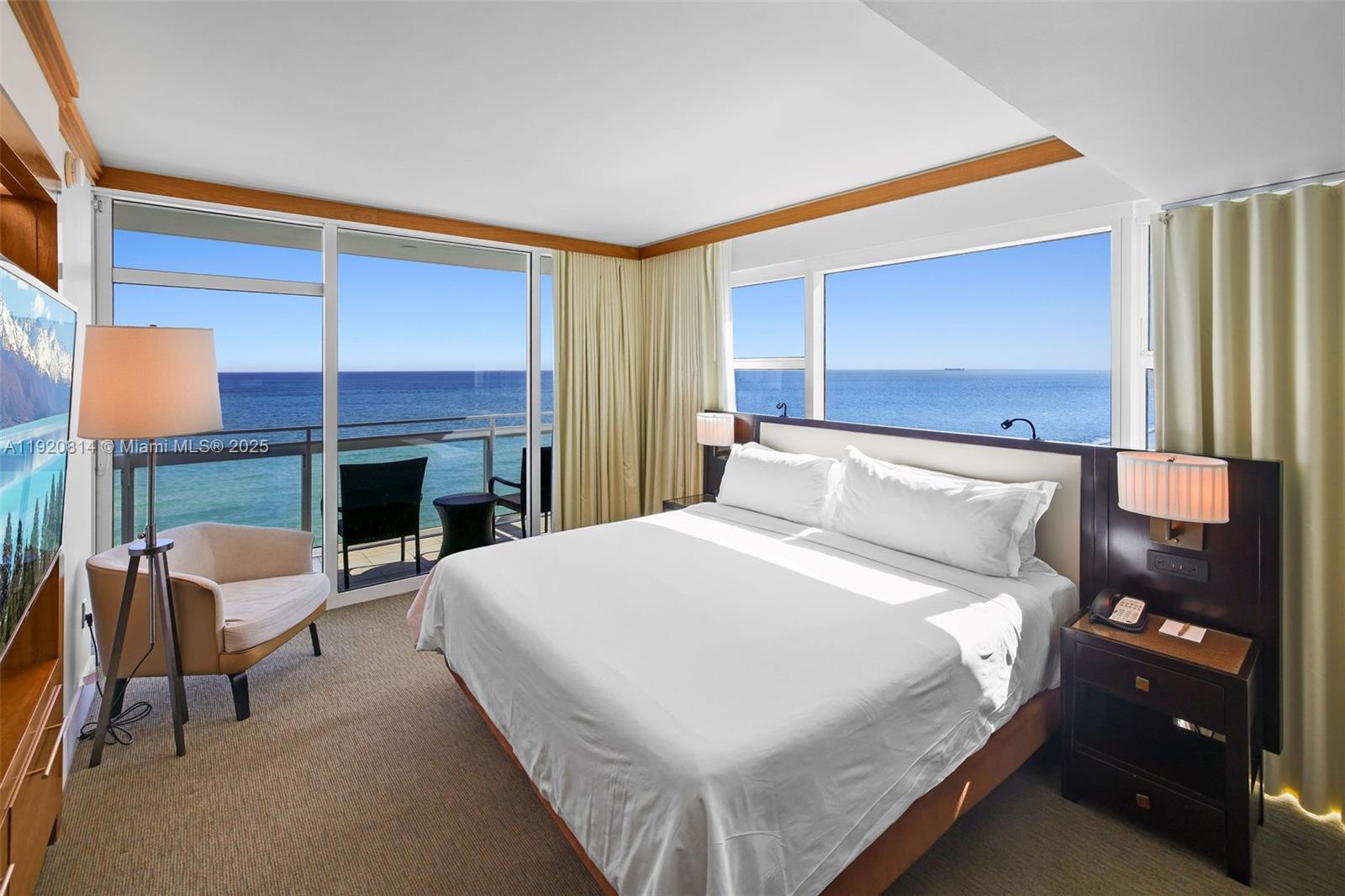 a bedroom with a bed and a fireplace