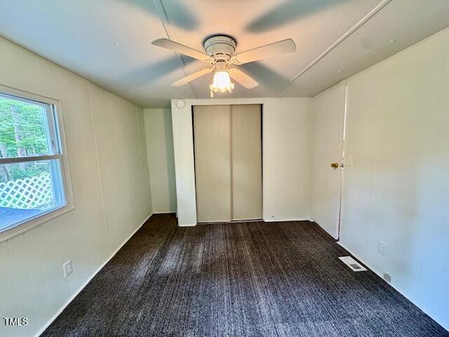 951 Harris Mill Road Rougemont, NC 27572 - Photo 18 of 89 a view of an empty room with wooden floor and a window