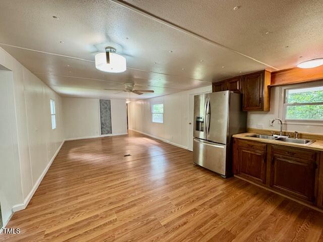 951 Harris Mill Road Rougemont, NC 27572 - Photo 28 of 89 a view of a kitchen with a sink and refrigerator