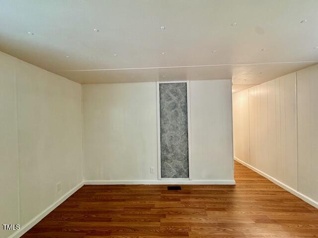 951 Harris Mill Road Rougemont, NC 27572 - Photo 29 of 89 a view of an empty room with wooden floor