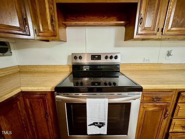 951 Harris Mill Road Rougemont, NC 27572 - Photo 31 of 89 a stove top oven sitting inside of a kitchen