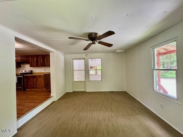 951 Harris Mill Road Rougemont, NC 27572 - Photo 37 of 89 a view of empty room with wooden floor and windows