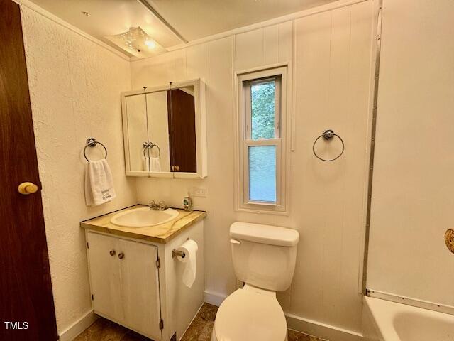 951 Harris Mill Road Rougemont, NC 27572 - Photo 45 of 89 a bathroom with a granite countertop sink toilet and shower