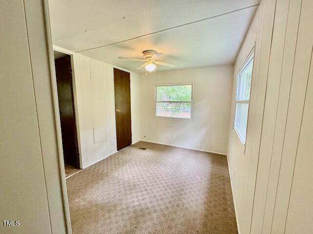 951 Harris Mill Road Rougemont, NC 27572 - Photo 48 of 89 a view of a big room with windows and chandelier fan