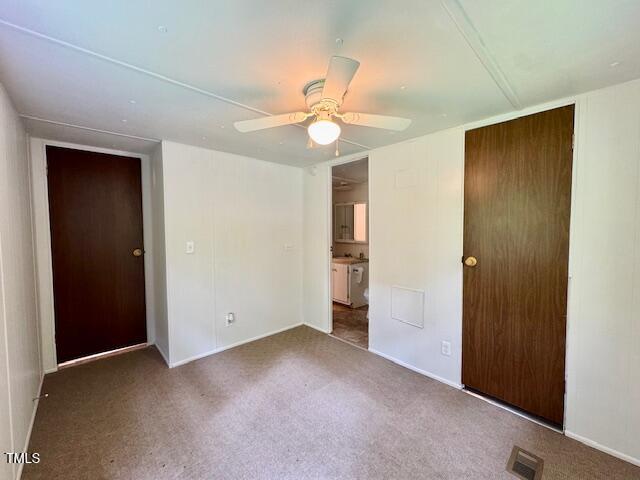 951 Harris Mill Road Rougemont, NC 27572 - Photo 49 of 89 an empty room with closet and a ceiling fan