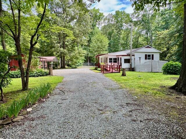 951 Harris Mill Road Rougemont, NC 27572 - Photo 79 of 89 a view of a house with a yard and sitting area