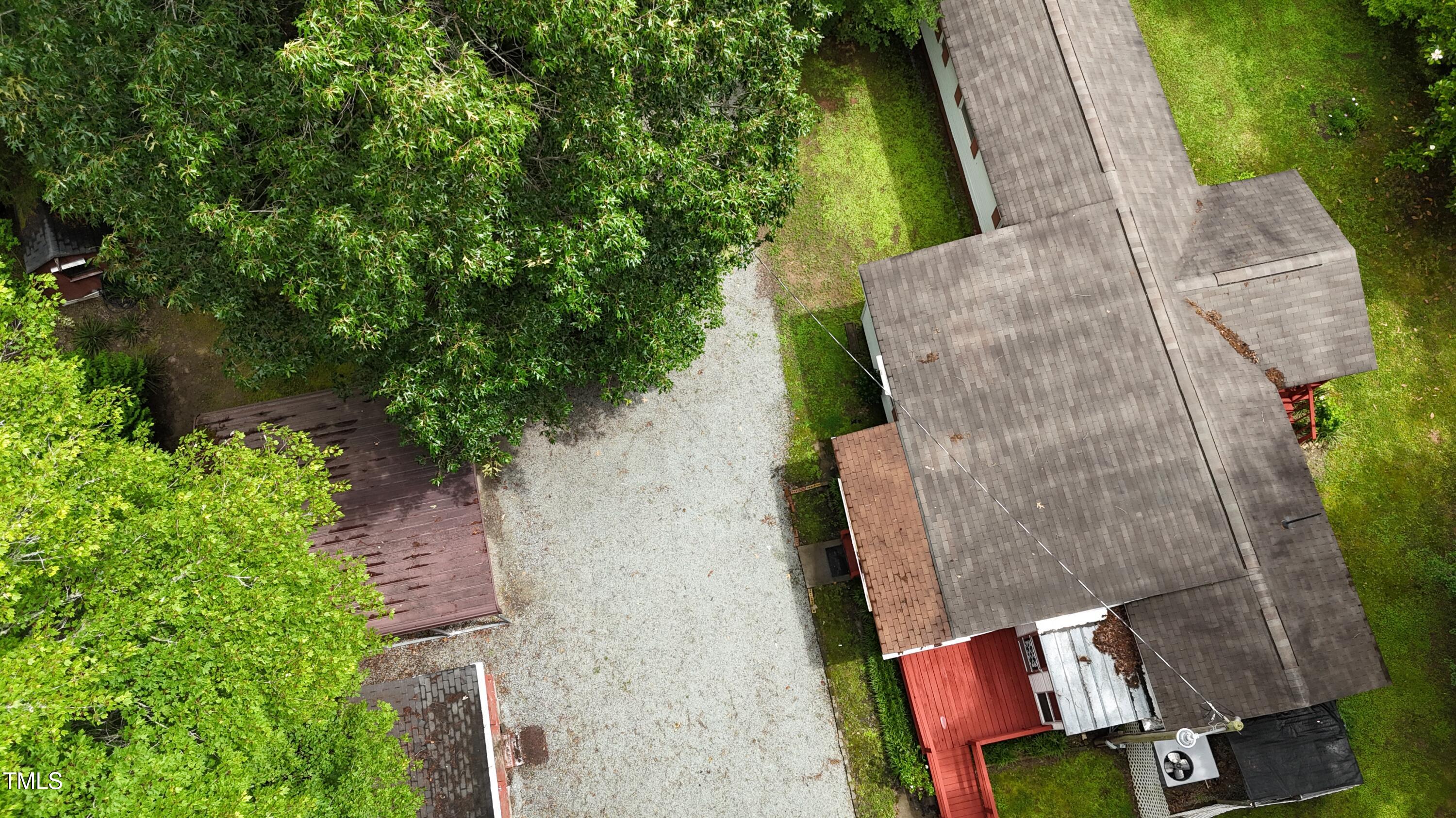 951 Harris Mill Road Rougemont, NC 27572 - Photo 88 of 89 an aerial view of a house with a yard and garden