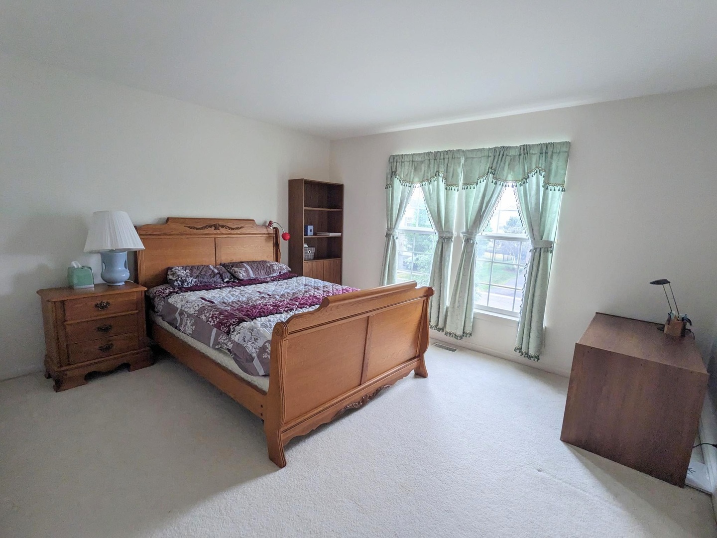 24632 Apollo Drive Plainfield, IL 60585 - Photo 12 of 22 a bedroom with a bed and a couch