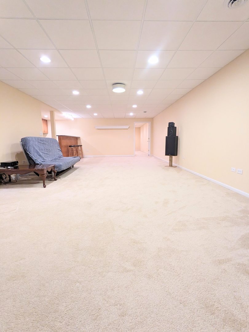 24632 Apollo Drive Plainfield, IL 60585 - Photo 19 of 22 a view of an empty room with a window